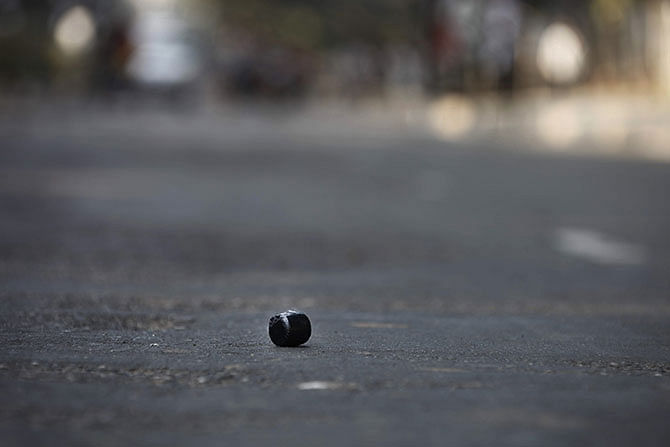 In this Star file photo, a crude bomb lies in an abandoned condition on a road in Dhaka city during a hartal period.