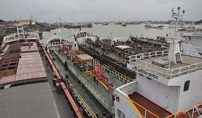 Lighter vessels stand at the outer anchorage of the Chittagong port following a strike on Saturday enforced by its workers demanding their safety. Photo: STAR 