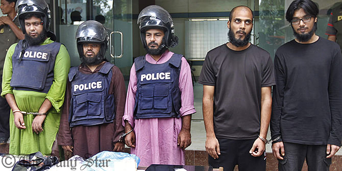 Five men including sons of a senior bureaucrat and a former judge were produced before journalists on Thursday hours after detectives arrested them in different parts of Dhaka. Photo: Rashed Shumon