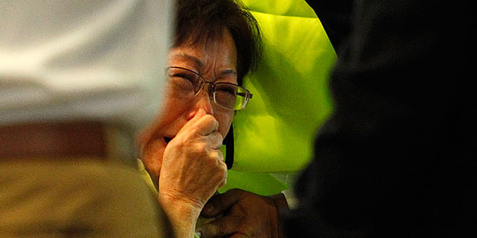 Malaysian Siti Dina weeps after seeing her daughter's name on the list of passengers on board Malaysia Airlines MH17 at Kuala Lumpur International Airport in Sepang July 18, 2014. Her daughter Shelisa Zaini, Shelisa's Dutch husband and their three children were on board the plane en-route to Melbourne, Australia.  Photo: Reuters