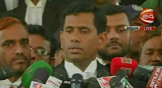 Defence counsel spokesperson Tajul Islam speaking to reporters after a war crimes tribunal handed Jamaat-e-Islami leader ATM Azharul Islam death for war crimes of 1971 on Tuesday, December 30, 2914. Photo: TV grab