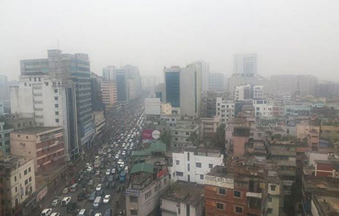 The horizon remains hazy due to foggy cloud and intermittent rain at the capital today. The photo was taken from Kawran Bazar area. Photo: Star