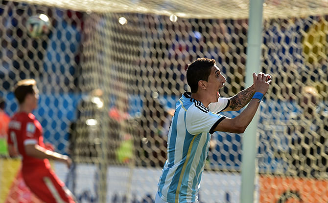 Argentina's midfielder Angel Di Maria celebrates after scoring the 1-0 during a Round of 16 football match between Argentina and Switzerland at Corinthians Arena in Sao Paulo during the 2014 FIFA World Cup on July 1, 2014. Photo: Getty Images