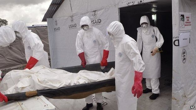 Health workers wearing Ebola protective gear remove the body of a man that they suspect died from the Ebola virus in Liberia More than 6,000 people have now died from Ebola, the vast majority in this corner of West Africa