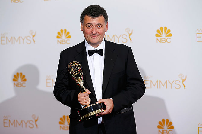 Writer Steven Moffat poses with his Outstanding Writing for a Miniseries, Movie or a Dramatic Special award for the PBS/BBC miniseries 