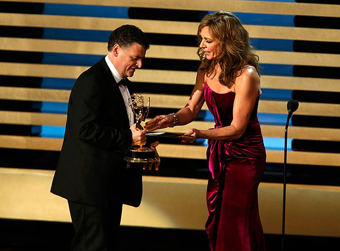 Allison Janney presents the award to Steven Moffat for Outstanding Writing for a Miniseries, Movie or a Dramatic Special for PBS 