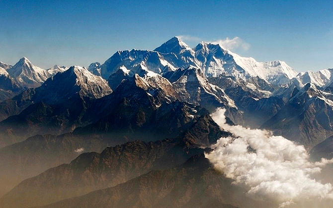Mount Everest (C), the world's highest peak, and other peaks of the Himalayan range are seen from air during a mountain flight from Kathmandu, in this Reuters file photo taken April 24, 2010. 