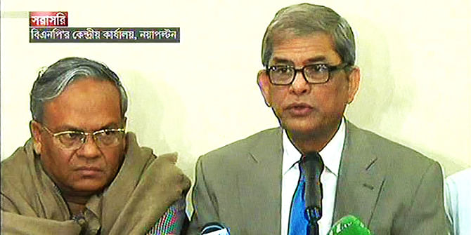 BNP acting secretary general Mirza Fakhrul Islam Alamgir flanked by party Joint Secretary General Rizvi Ahmed addresses at press conference at party headquarters in Nayapaltan of the capital on Monday. Photo: TV grab