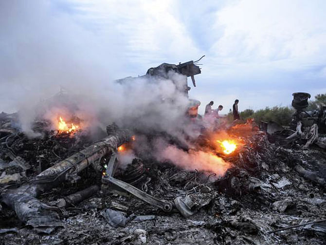 Debris of the Boeing 777, Malaysia Arilines flight MH17, which crashed during flying over the eastern Ukraine region near Donetsk. Photo: The Independent
