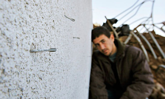 A image taken in 2009 of darts from a flechette shell embedded in a wall in Gaza. Photo: AP