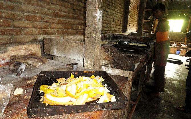 Toxic chemical is being used to enhance colour of food items in an illegal bakery at Durakutihat area in Lalmonirhat Sadar upazila. Photo: Star file