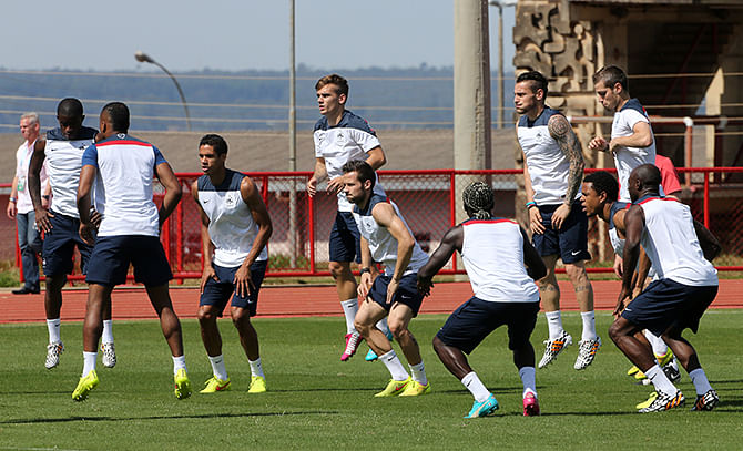 Players of France warm up during a practice session on the eve of the 2014 FIFA World Cup Brazil round of 16 match between France and Nigeria at the local 'Bombeiros' Firefighters Training Camp on June 29, 2014 in Brasilia, Brazil. Photo: Getty Images