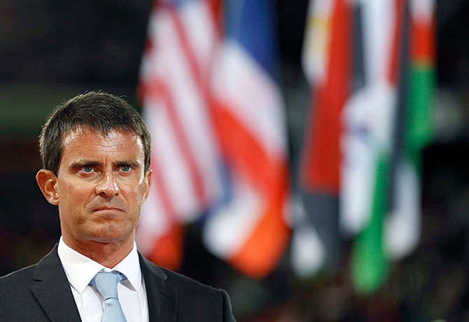 French Prime Minister Manuel Valls attends the opening ceremony of the world Equestrian Games at the d'Ornano stadium in Caen, August 23, 2014. Photo: Reuters