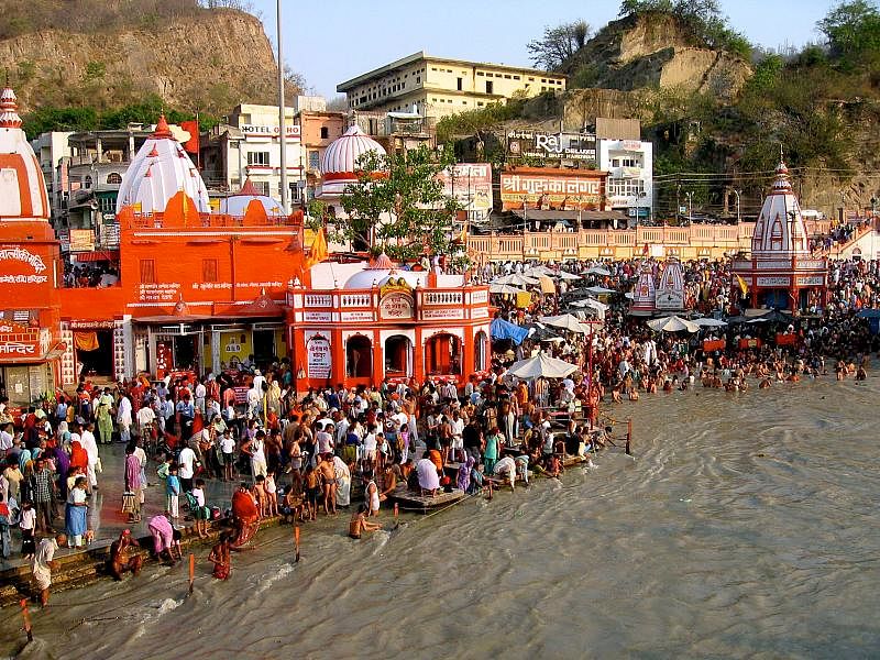 Hindu devotees take holy bath during festival of Ganga Dashara at Har-ki-Pauri in Haridwar of India. The photo is taken from Wikipedia.