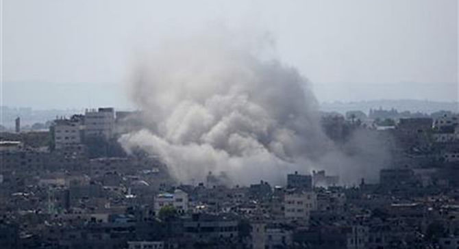 Smoke rises after an Israeli missile strike in Gaza City, Monday. Photo: AP 