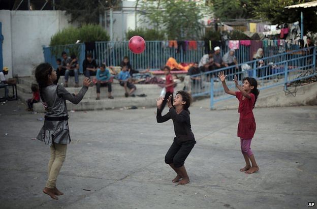 Palestinian children play at a UN school in Gaza's Jabaliya refugee camp
