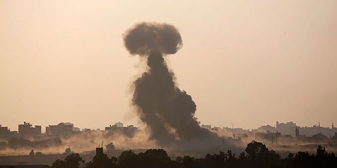 Smoke rises in the Gaza Strip after an Israeli strike August 3, 2014. An Israeli air strike killed 10 people and wounded about 30 on Sunday in a UN-run school in the southern Gaza Strip, a Palestinian official said, as dozens died in Israeli shelling of the enclave and Hamas fired rockets at Israel. Photo: Reuters
