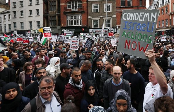 Pro-Palestinian demonstrators fill the street outside the Israeli embassy on July 11, 2014 in London, United Kingdom. Israel says it will resist international pressure to halt operations in Gaza. Photo: Getty Images