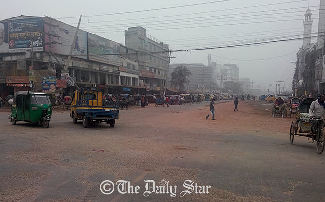 A few vehicle are seen plying on the street in Gazipur city during Saturday's hartal enforced by BNP-led 20-party alliance. Photo: Star