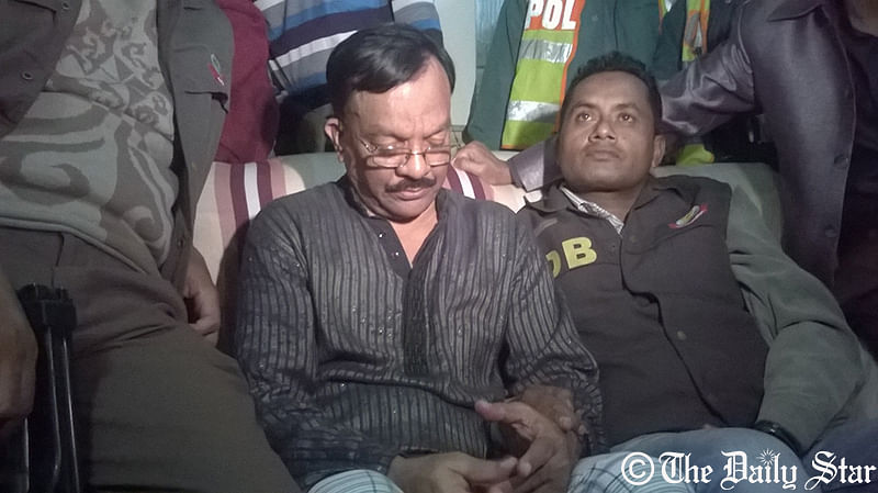 Sheikh Md Ali, owner of the flat, from where Customs Intelligence officials and detectives seize several sacks and luggage full of gold and foreign currencies at Purana Paltan in Dhaka on Thursday, December 25, 2014. Photo: Akram Hosen