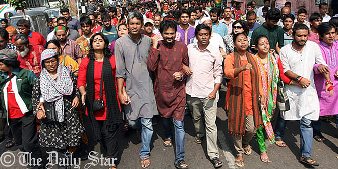Activists of Gonojagoron Mancha bring out a joyous procession in Dhaka city after announcement of verdict against Jamaat leader Mir Quasem Ali on Sunday. Photo: STAR