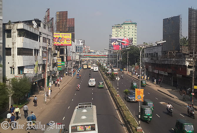 Vehicles are seen plying on roads in Dhaka city on Monday defying nationwide hartal enforced by Jamaat-e-Islami protesting death penalty verdict against its leader Motiur Rahman Nizami. Photo: Zaid Kalam
