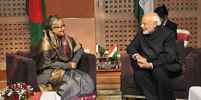 Prime Minister Sheikh Hasina meets her Indian counterpart Narendra Modi after the inaugural meeting of the 18th Saarc Summit in Nepal on Wednesday. Photo: Courtesy 
