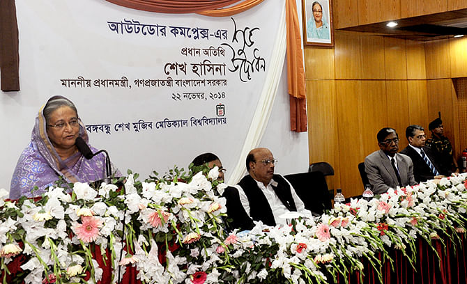 Sheikh Hasina addresses the inaugural session of the newly constructed outdoor complex of the Bangabandhu Sheikh Mujib Medical University (BSMMU) Saturday. Photo: BSS