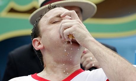 Joey Chestnut competes at the Nathan's hot-dog eating contest in Coney Island. Photo taken from the Guardian website.