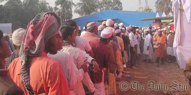 Devotees queue up in front of a medical camp, set up on Munnu Textile Mill premises, to have medicare on the second day of second phase of Biswa Ijtema, the second biggest congregation of Muslims after Hajj. Photo: Star   
