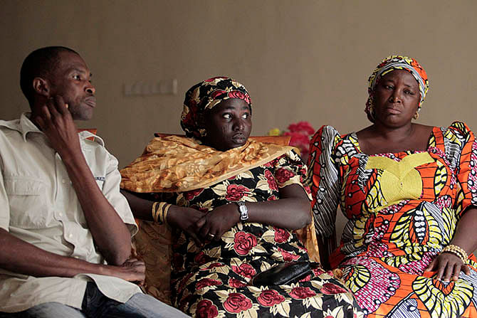 Rebecca Samuel (C), mother of Sarah, one of the abducted Chibok schoolgirls, sits with other parents during a meeting to review efforts to recover the abducted Chibok girls, organised by the Chibok Community Association in collaboration with the #BringBackOurGirls campaign, in Abuja January 1, 2015. . Picture taken January 1, 2015. Photo: Reuters