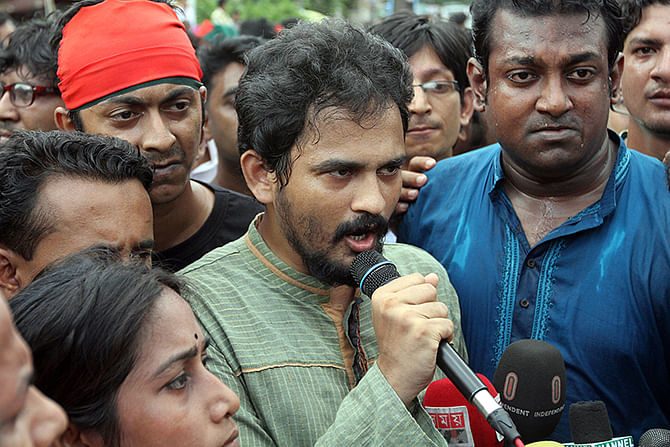 This undated Star file photo shows Gonojagoron Mancha spokesperson Imran H Sarker (c) talking with the reporters.  