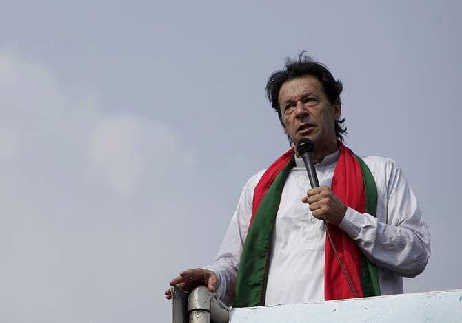 Chairman of the Pakistan Tehreek-e-Insaf (PTI) political party Imran Khan addresses his supporters during what has been dubbed a "freedom march" in Islamabad August 21, 2014. Photo: Reuters