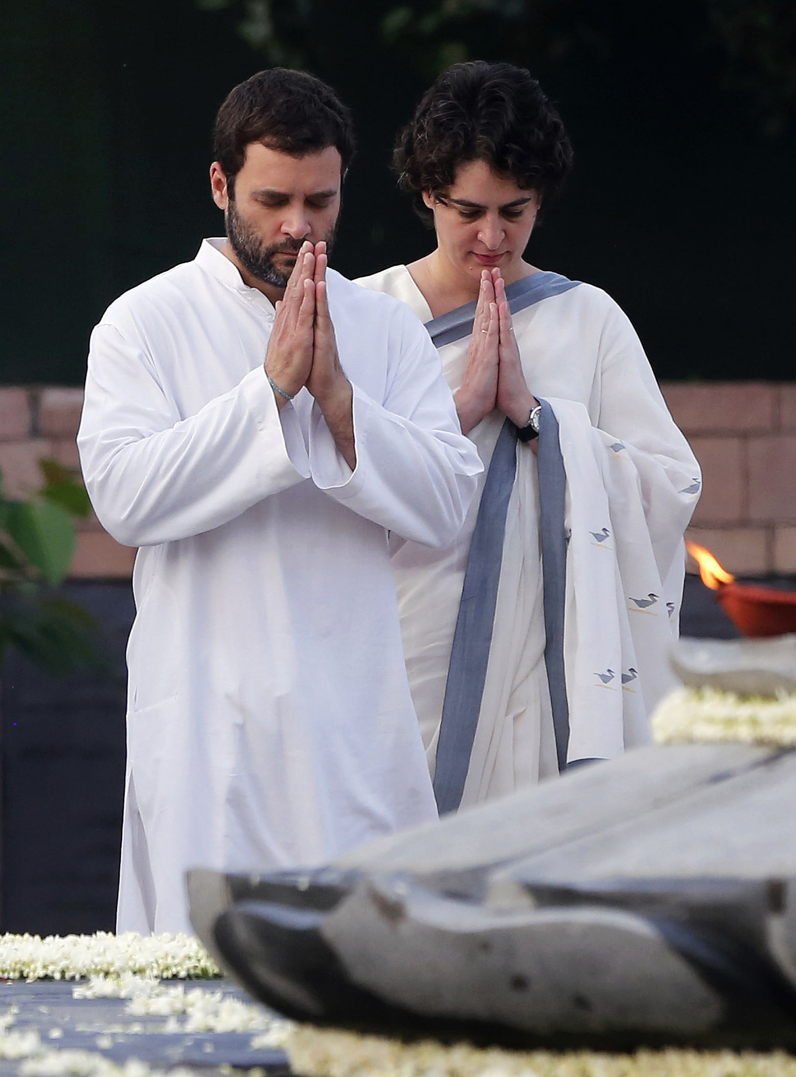 Rahul Gandhi and his sister Priyanka Gandhi Vadra pay tribute at the memorial of former prime minister Rajiv Gandhi on the occasion of the former prime minister's 69th birth anniversary, in New Delhi on August 20, 2013. Reuters file photo.