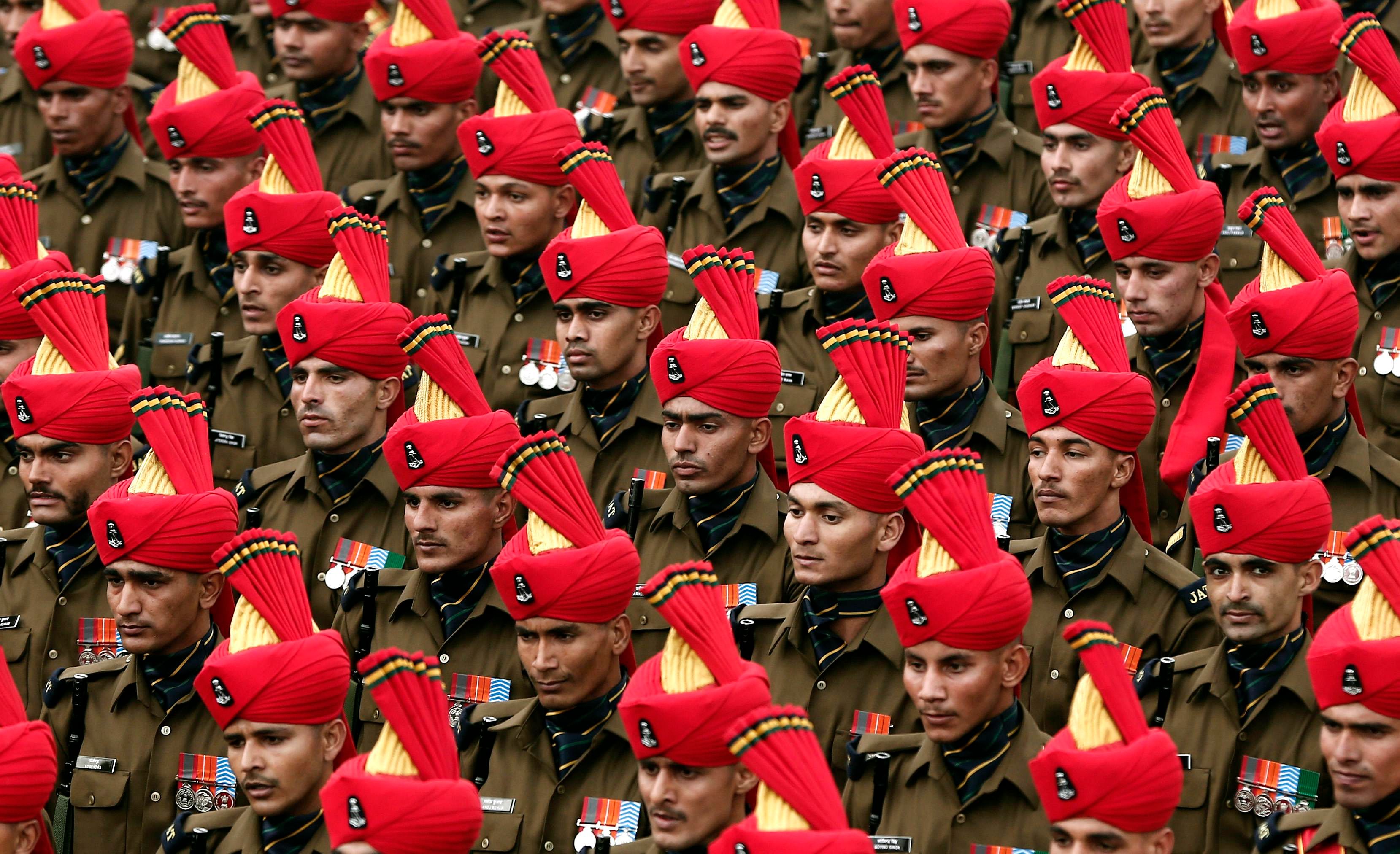 Indian soldiers march during a full dress rehearsal for the Republic Day parade in New Delhi January 23, 2015. India's capital will turn into a virtual fortress for US President Barack Obama's visit this weekend, with heightened security measures, including an extended no-fly zone, to protect the world's most powerful leader. Photo: Reuters