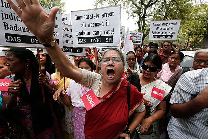 Demonstrators from All India Democratic Women's Association (AIDWA) hold placards and shout slogans during a protest against the recent killings of two teenage girls, in New Delhi on Saturday. The two teenage girls were raped and hanged from a tree this week in the northern Indian state of Uttar Pradesh sparking public anger and political controversy over the attack gain momentum. Photo: Reuters
