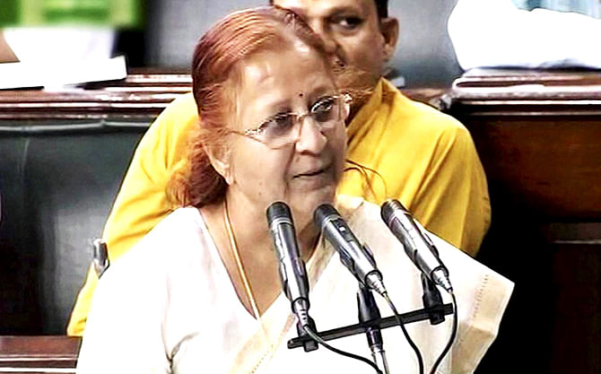 Senior BJP leader Sumitra Mahajan takes oath as a Lok Sabha member during the second day of First session of 16th Lok Sabha, in New Delhi. This photo is taken from the Hindustan Times.