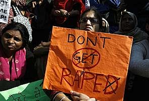 This AP file photo shows women participating in a protest in New Delhi on Tuesday condemning the gang-rape of a 23-year-old student on a city bus.