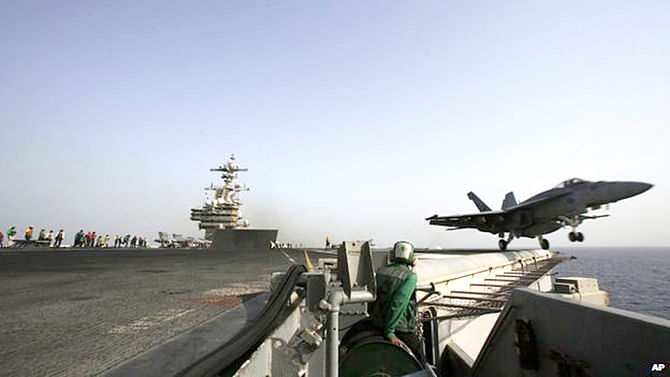 US air strikes have been launched from an aircraft carries in the Gulf. Photo: AP