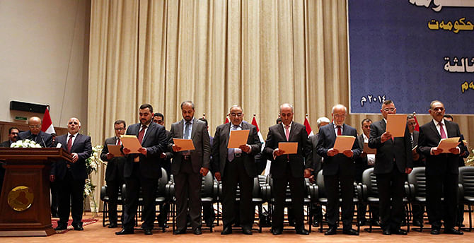 New Iraqi government officials participate in a swearing-in ceremony in Baghdad September 8. Photo: Reuters  