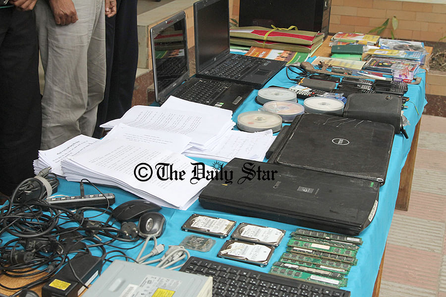 Detectives seize passports, mobile phones, Pakistan's visa application form, laptops, leaflets, and books and video clips on militancy from four militants including 