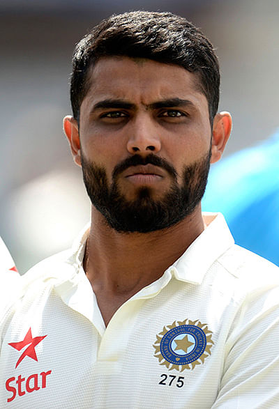 India's Ravindra Jadeja looks on before a team photograph is taken before Thursday's second cricket test match against England at Lord's cricket ground in London July 16. Photo: Reuters 