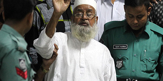This undated Star photo shows police escorting Jamaat leader Abdus Subhan at the International Crimes Tribunal in Dhaka.