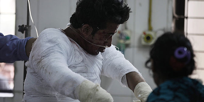 Bappy wrapped in bandage at the burn unit of the Dhaka Medical College and Hospital Wednesday, January 21, 2015. The Chhatra Dal leader lost his right hand and injured his nephew and niece while the bomb he allegedly was making went off at his Lalbagh home. Photo: Star