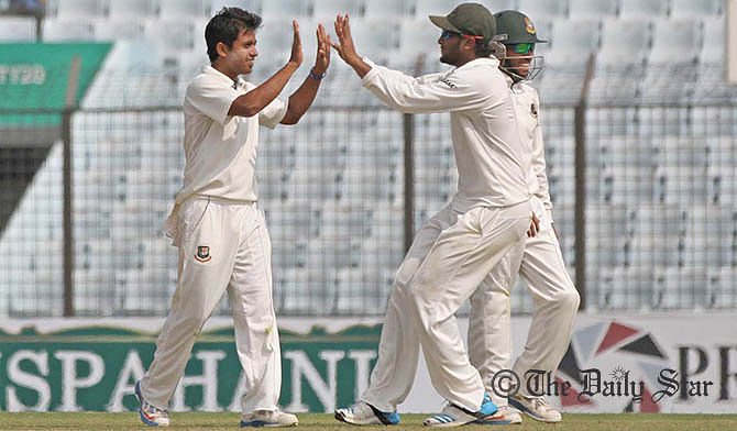 Jubair Hossain congratulated by teammates after clipping two Zimbabwean wickets in an over on the day 3 of the third Test at Chittagong on Friday. Photo: Anurup Kanti Das