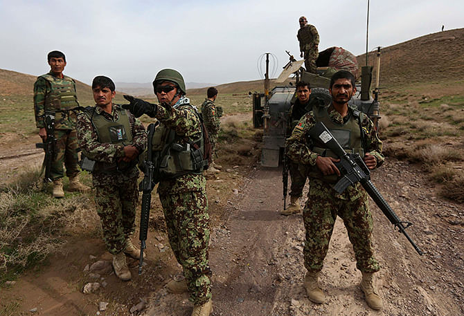 Afghan National Army soldiers (ANA) patrol at Nahr-e- Kanjak village at Adraskan district of Herat Province on Thursday. The Afghan presidential elections will be held on April 5. Photo: Reuters