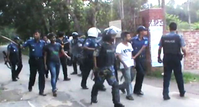 Policemen take the JU unit BCL men to Savar Police Station after detaining them on Sunday in connection with extortion. Photo Star