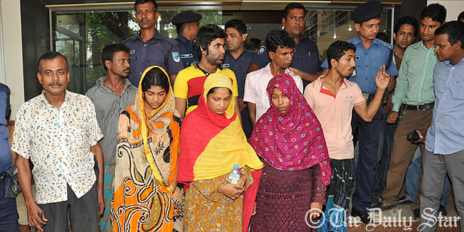 Police produce the seven arrested people over last Wednesday’s killing of a couple and their children in Keraniganj at DMP media centre on Friday. Photo: Firoz Ahmed