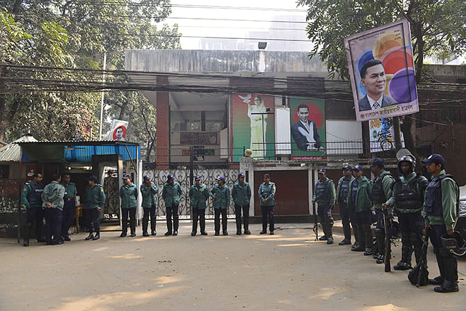 A Star file photo shows policewomen stand guard in front of BNP Chairperson Khaleda Zia's Gulshan office in Dhaka during the time when she was held confined in January.