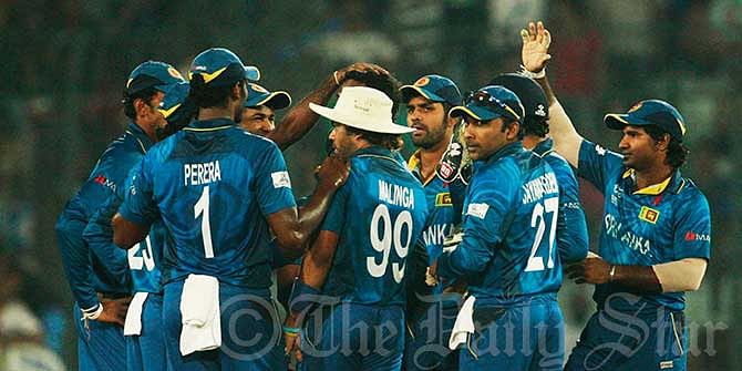 Sri Lanka celebrate another wicket as some brilliant bowling fromthe Lankans restricted India to 130 in the final of the World T20 in Mirpur on Sunday. Photo: Firoz Ahmed